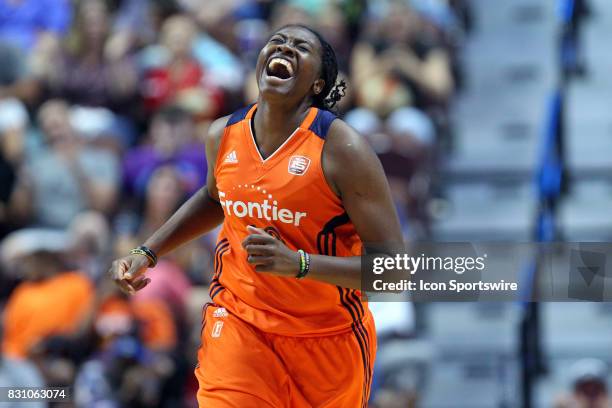 Connecticut Sun guard Shekinna Stricklen reacts after making a three point jump shot during the second half of an WNBA game between Dallas Wings and...