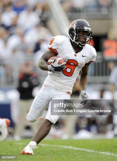 James Rodgers of the Oregon State Beavers runs with the ball against the Penn State Nittany Lions at Beaver Stadium on September 6, 2008 in State...