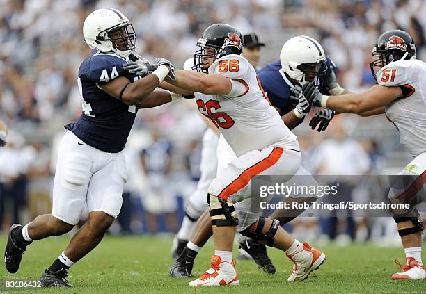 Andy Levitre of the Oregon State Beavers blocks Kevion Latham of the Penn State Nittany Lions during the game at Beaver Stadium on September 6, 2008...