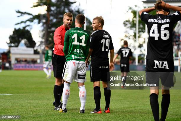 Arni Viljhjalmsson of Jonkopings Sodra talking to referee Glenn Nyberg during the Allsvenskan match between Jonkopings Sodra IF and Orebro SK at...