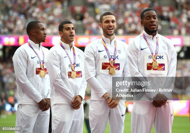 Chijindu Ujah, Adam Gemili, Daniel Talbot and Nethaneel Mitchell-Blake of Great Britain, gold, pose with their medals for the Men's 4x100 Metres...