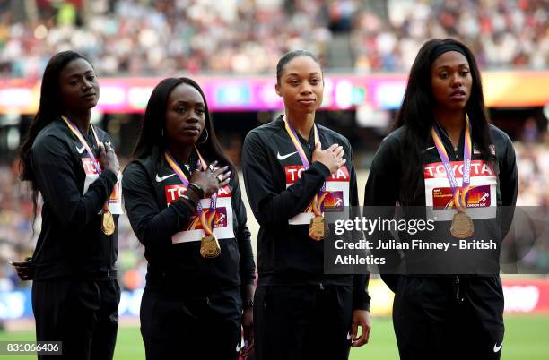 Aaliyah Brown, Allyson Felix, Morolake Akinosun and Tori Bowie of the United States, gold, pose with their medals for the Women's 4x100 Metres Relay...