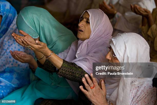 Kashmiri women attend Friday prayers at the Jamia mosque October 3, 2008 in Srinagar, Kashmir, India. Kashmiri people have been protesting against...