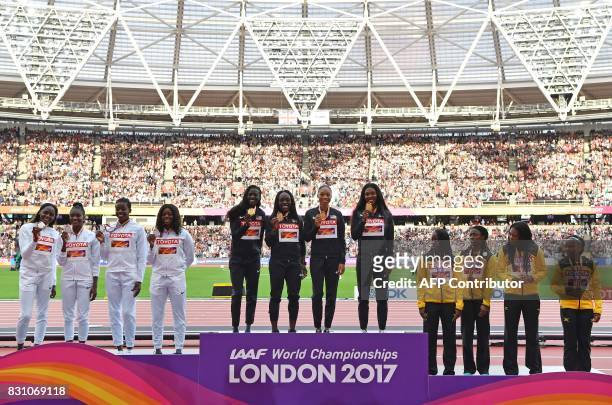 Silver medallists Britain's Asha Philip, Desiree Henry, Dina Asher-Smith and Daryll Neita , gold medallists US athletes Aaliyah Brown, Morolake...
