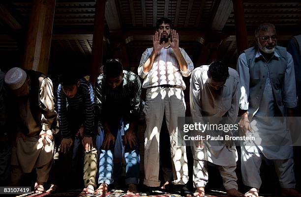 Kashmiri men attend Friday prayers at the Jamia mosque October 3, 2008 in Srinagar, Kashmir, India. Kashmiri people have been protesting against...