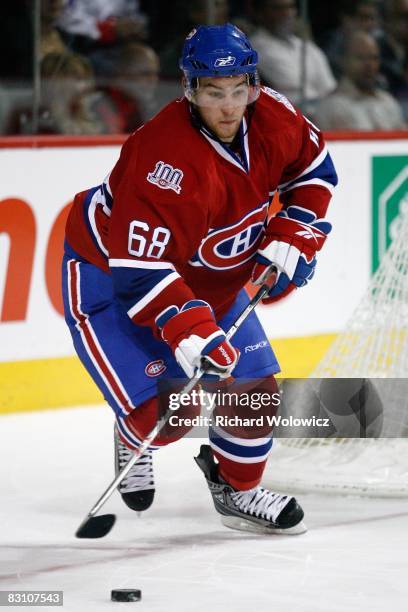 Yannick Weber of the Montreal Canadiens skates with the puck during the game against the Detroit Red Wings at the Bell Centre on September 30, 2008...