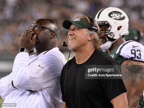 New York Jets outside linebacker coach Kevin Greene reacts to the play during the preseason football game between the Tennessee Titans and the New...