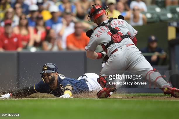 Jonathan Villar of the Milwaukee Brewers scores during the first inning against the Cincinnati Reds at Miller Park on August 13, 2017 in Milwaukee,...