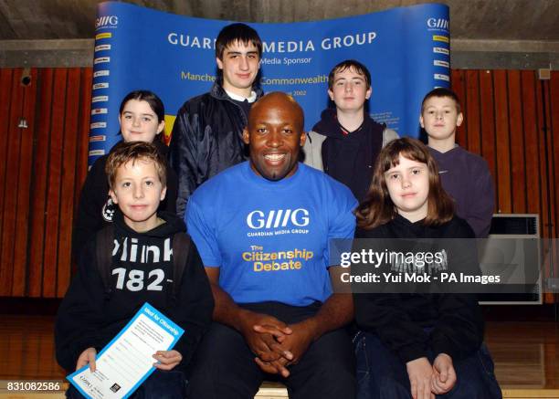 Olympic and Commonwealth Games Medal winner John Regis surrounded by pupils Charlie Binns, and Gemma Timlin, Carly White, Michael Toti, Chris O'Neill...