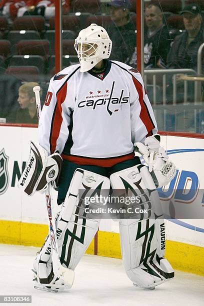 Goaltender Simeon Varlamov of the Washington Capitals warms up before the game against the Carolina Hurricanes at RBC Center on September 24, 2008 in...