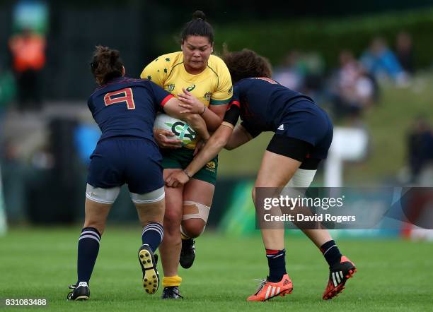 Sharni Williams of Australia is tackled by Yanna Rivoalen and Caroline Drouin of France during the Women's Rugby World Cup 2017 match between France...