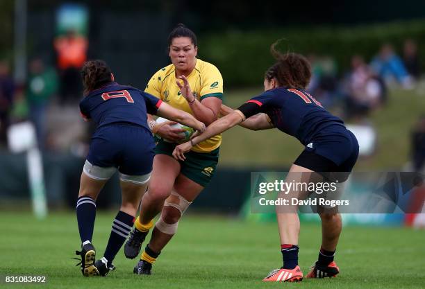 Sharni Williams of Australia is tackled by Yanna Rivoalen and Caroline Drouin of France during the Women's Rugby World Cup 2017 match between France...