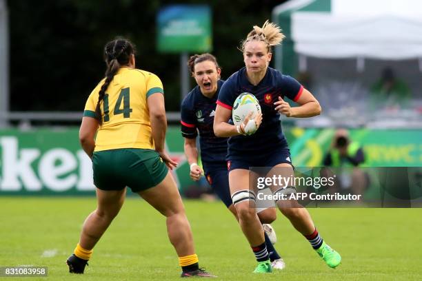 France's flanker Romane Menager takes on Australia's wing Nareta Marsters during the Women's Rugby World Cup 2017 pool C rugby match between France...