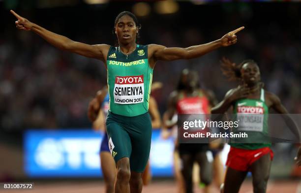 Caster Semenya of South Africa celebrates as she crosses the line ahead of Francine Niyonsaba of Burundi to win the Womens 800 metres during day ten...