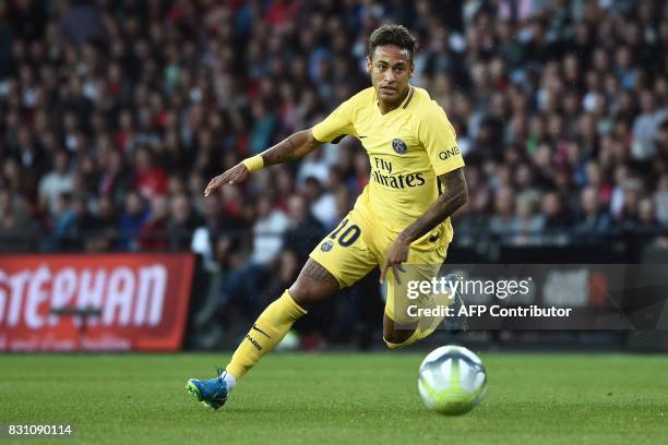 Paris Saint-Germain's Brazilian forward Neymar drives the ball during the French L1 football match Paris Saint-Germain vs En Avant Guingamp at the...