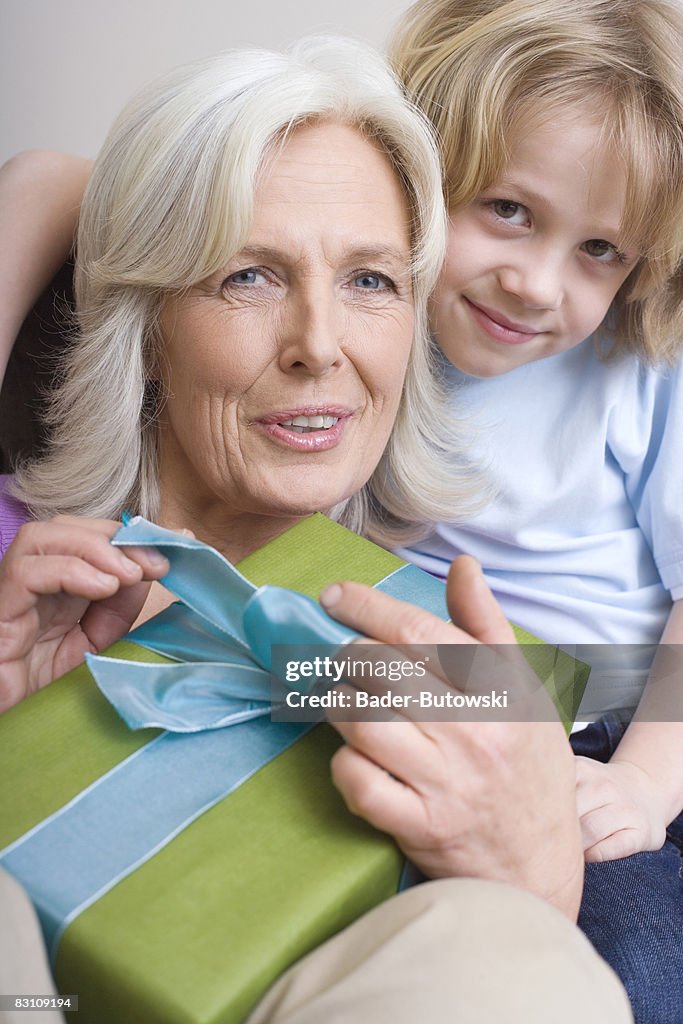 Grandson (8-9) with present from grandmother, portrait