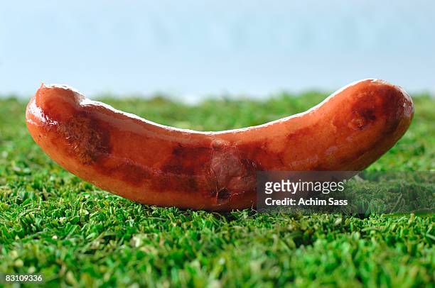 german bratwurst, fried sausage, close-up - sausage stock pictures, royalty-free photos & images