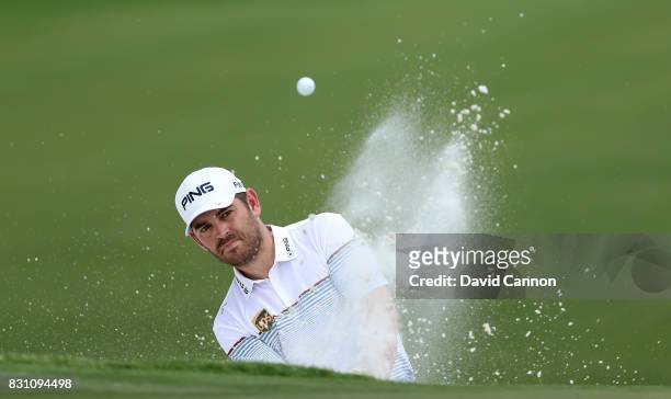 Louis Oosthuizen of South Africa plays his third shot on the par 4, first hole during the final round of the 2017 PGA Championship at Quail Hollow on...