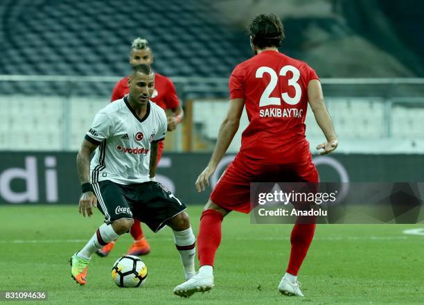 Ricardo Querasma of Besiktas is in action against Aytac Sakib of Antalyaspor during a Turkish Spor Toto Super Lig soccer match between Besiktas JK...