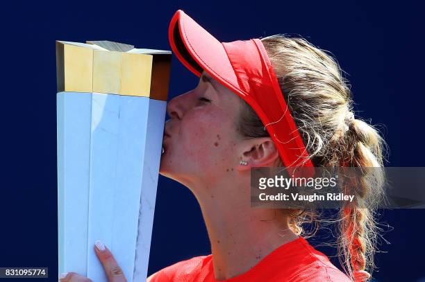Elina Svitolina of Ukraine with the winners trophy after defeating Caroline Wozniacki of Denmark following the final match on Day 9 of the Rogers Cup...