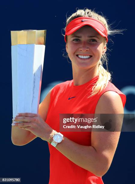 Elina Svitolina of Ukraine with the winners trophy after defeating Caroline Wozniacki of Denmark following the final match on Day 9 of the Rogers Cup...