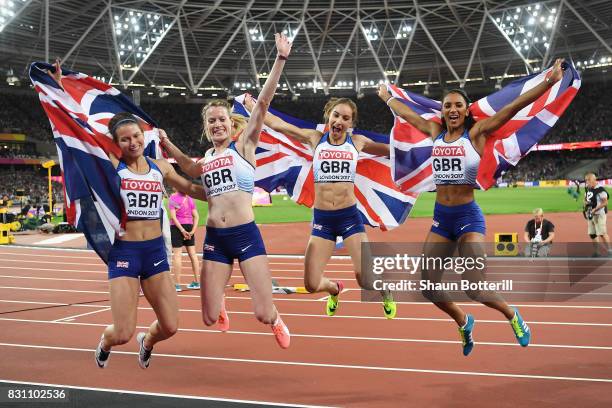 Zoey Clark, Laviai Nielsen, Eilidh Doyle and Emily Diamond of Great Britain celebrate winning silver in the Women's 4x400 Metres Relay final during...
