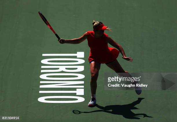 Elina Svitolina of Ukraine plays a shot against Caroline Wozniacki of Denmark during the final match on Day 9 of the Rogers Cup at Aviva Centre on...