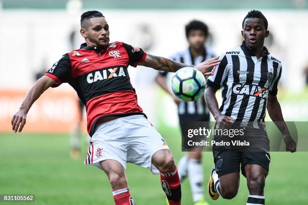 Cazares of Atletico MG and Para of Flamengo battle for the ball during a match between Atletico MG and Flamengo as part of Brasileirao Series A 2017...