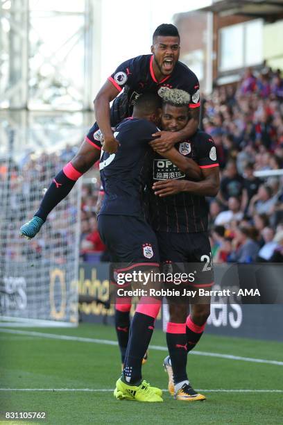 Steve Mounie of Huddersfield Town celebrates after scoring a goal to make it 0-3 during the Premier League match between Crystal Palace and...