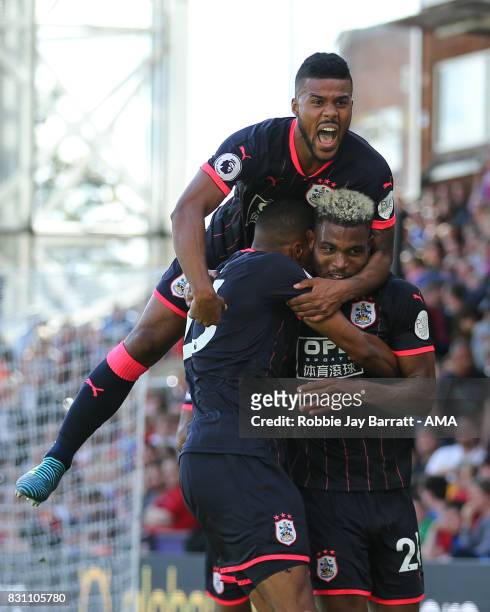 Steve Mounie of Huddersfield Town celebrates after scoring a goal to make it 0-3 during the Premier League match between Crystal Palace and...