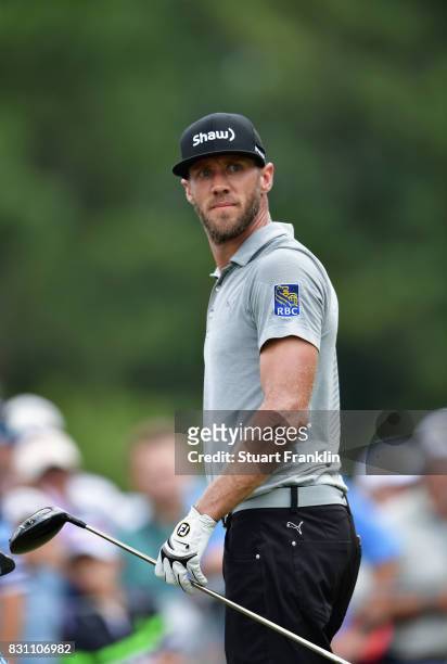 Graham DeLaet of Canada reacts to his shot on the third tee during the final round of the 2017 PGA Championship at Quail Hollow Club on August 13,...