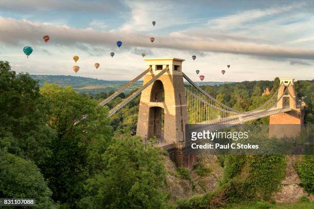 clifton suspension bridge with balloons - bristol fotografías e imágenes de stock
