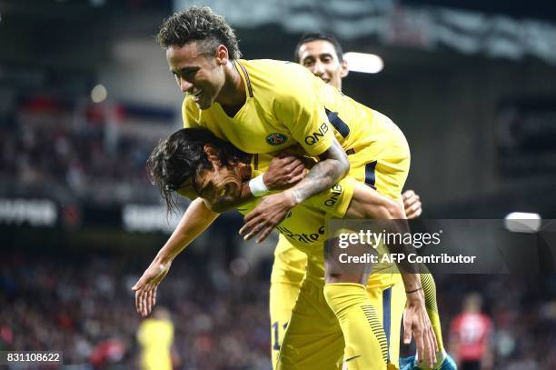 Paris Saint-Germain's Uruguayan forward Edinson Cavani and Paris Saint-Germain's Brazilian forward Neymar celebrate during the French L1 football...