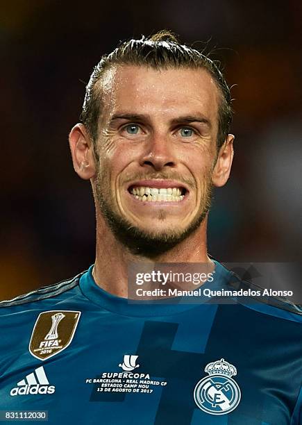 Gareth Bale of Real Madrid reacts during the Supercopa de Espana Supercopa Final 1st Leg match between FC Barcelona and Real Madrid at Camp Nou on...