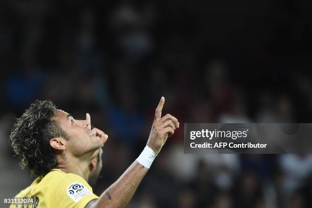 Paris Saint-Germain's Brazilian forward Neymar celebrates after scoring a goal during the French L1 football match Paris Saint-Germain vs En Avant...