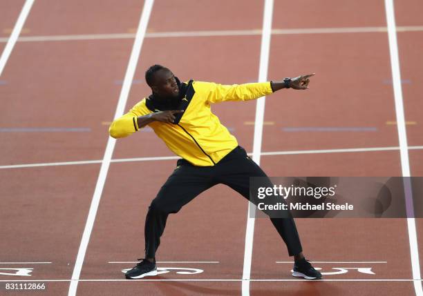 Usain Bolt of Jamaica bids farewell to fans after his last World Athletics Championships during day ten of the 16th IAAF World Athletics...