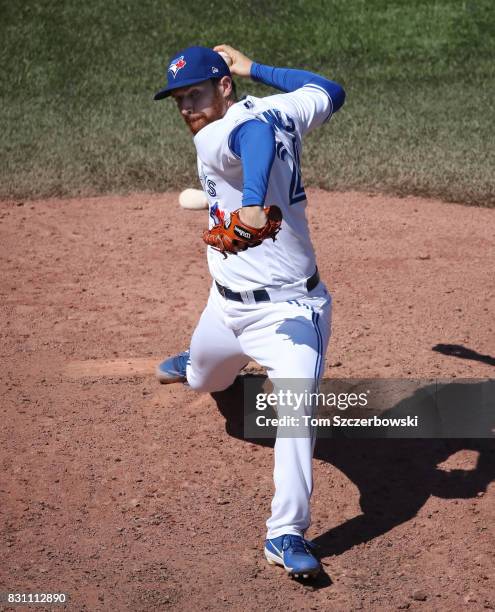 Danny Barnes of the Toronto Blue Jays delivers a pitch in the seventh inning during MLB game action against the Pittsburgh Pirates at Rogers Centre...