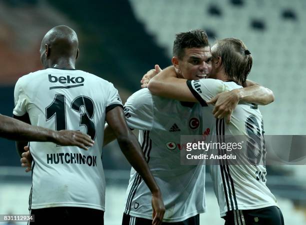 Pepe of Besiktas celebrates their score with his teammates during a Turkish Spor Toto Super Lig soccer match between Besiktas JK and Antalyaspor at...