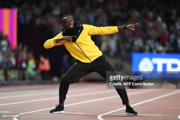 Jamaica's Usain Bolt takes part in a lap of honour on the final day of the 2017 IAAF World Championships at the London Stadium in London on August...
