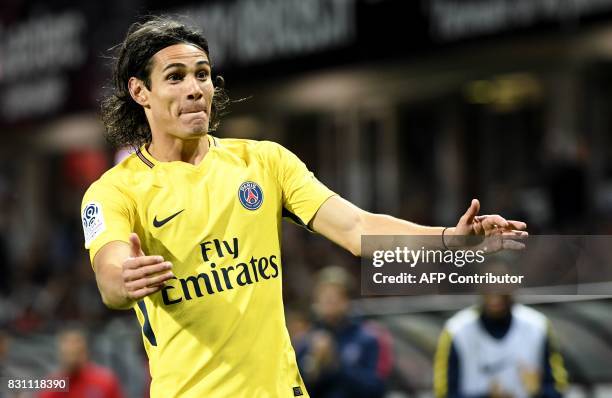 Paris Saint-Germain's Uruguayan forward Edinson Cavani celebrates after scoring during the French L1 football match Paris Saint-Germain vs En Avant...