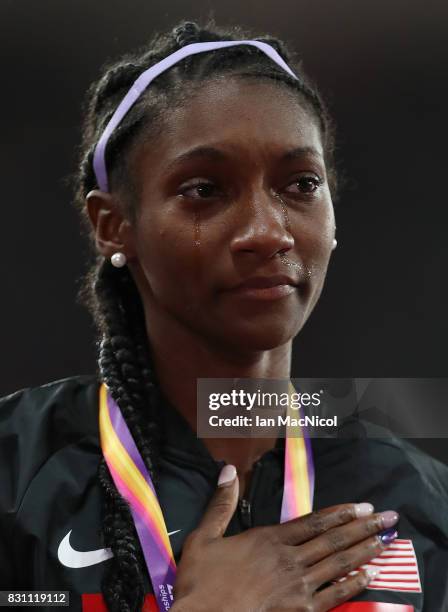 Tori Bowie of United States is seen on the podium with her gold medal from the Women's 4100m Relay final during day ten of the 16th IAAF World...