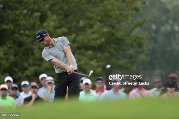 Graham DeLaet of Canada plays his shot from the 13th tee during the final round of the 2017 PGA Championship at Quail Hollow Club on August 13, 2017...