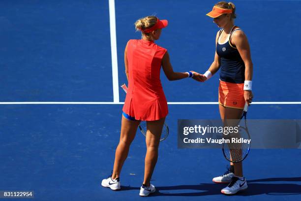 Ekaterina Makarova and Elena Vesnina of Russia compete against Anna-Lena Groenefeld of Germany and Kveta Peschke of Czech Republic in the doubles...