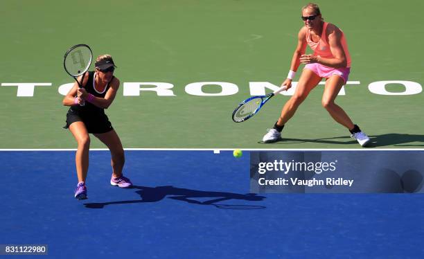 Anna-Lena Groenefeld of Germany and Kveta Peschke of Czech Republic compete against Ekaterina Makarova and Elena Vesnina of Russia in the doubles...