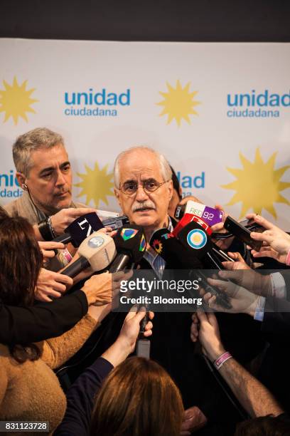Jorge Taiana, former foreign minister of Argentina, speaks to members of the media at the Unidad Ciudadana party headquarters during a primary...