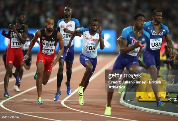 Machel Cedenio of Trinidad and Tobago, Rabah Yousif of Great Britain and Michael Cherry of United States in the Men's 4x400 Metres Relay final during...