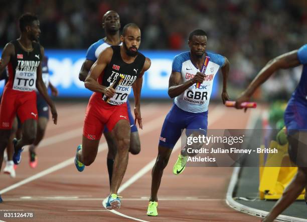 Machel Cedenio of Trinidad and Tobago, Rabah Yousif of Great Britain and Michael Cherry of United States in the Men's 4x400 Metres Relay final during...