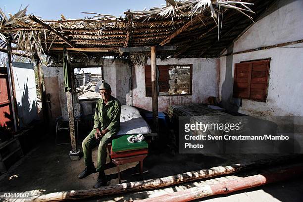 Rene Tejera Marino, 74-years-old, rests in what is left of his house after Hurricane Ike tore through a week earlier September 15, 2008 in the Playa...