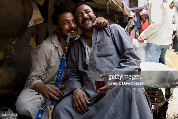 two guys smoking pipe - egyptian family imagens e fotografias de stock