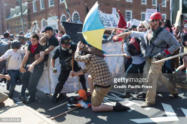 Neo-Nazis, white supremacists and other alt-right factions scuffled with counter-demonstrators near Emancipation Park in downtown Charlottesville,...
